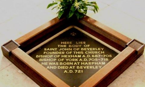 A black diamond-shaped floor slab marks the place of St John of Beverley's resting place.