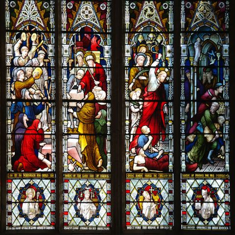 A view of one of the stained glass windows in the nave of Beverley Minster.